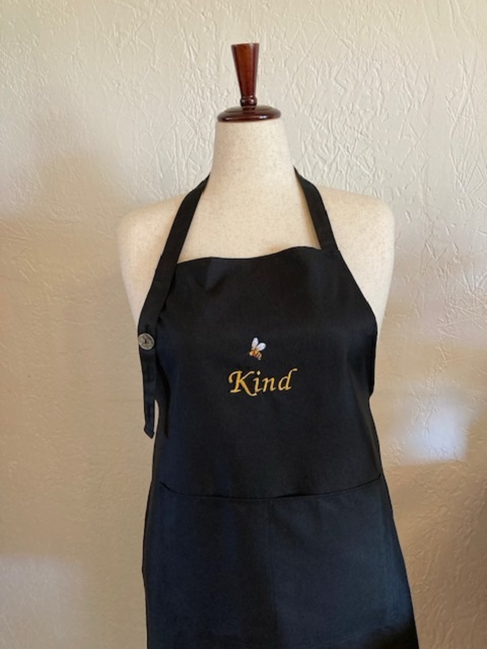 Embroidered 'Kind' Black Cotton Apron with Adjustable Neck